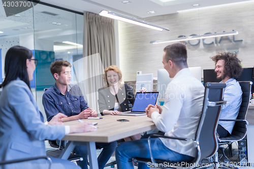 Image of Startup Business Team At A Meeting at modern office building
