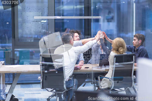 Image of startup Group of young business people celebrating success