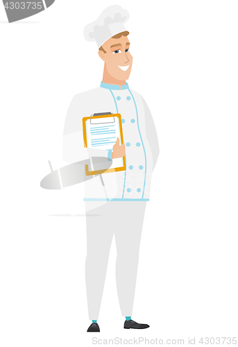 Image of Chef cook holding clipboard with documents.