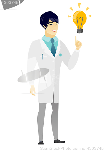 Image of Doctor pointing at bright idea light bulb.