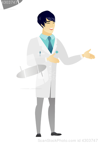 Image of Young asian happy doctor gesturing.