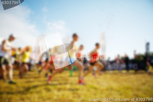 Image of Blurred photo of runners group