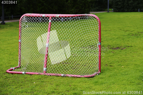 Image of red soccer goal at the playground