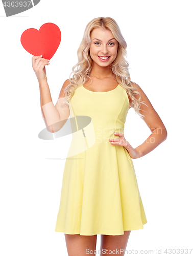Image of happy young woman with red paper heart
