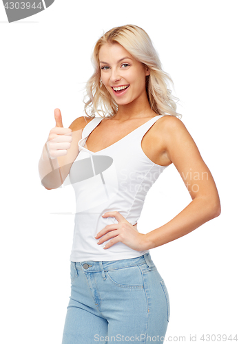 Image of happy young woman showing thumbs up