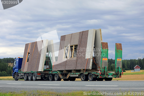 Image of Sisu Truck Hauls Precast Concrete Construction Elements