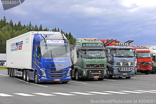 Image of Colorful Volvo FH Trucks on Truck Stop