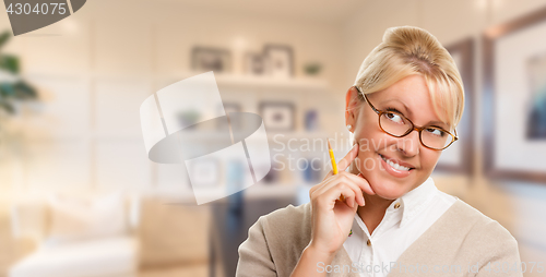 Image of Beautiful Expressive Student or Businesswoman with Pencil in Off