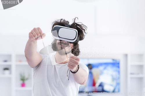 Image of man using VR-headset glasses of virtual reality