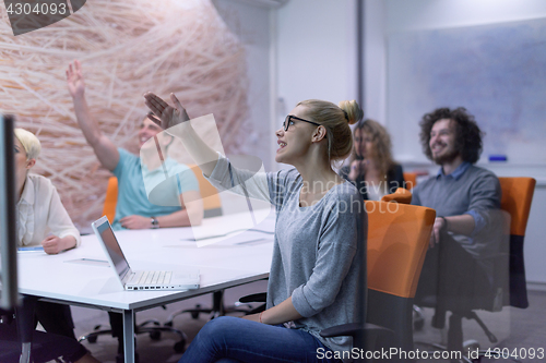 Image of Startup Business Team At A Meeting at modern night office buildi