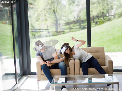 Image of Couple using virtual reality headset