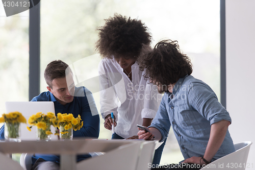 Image of Multiethnic startup business team on meeting