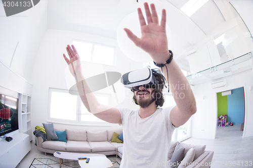 Image of man using VR-headset glasses of virtual reality