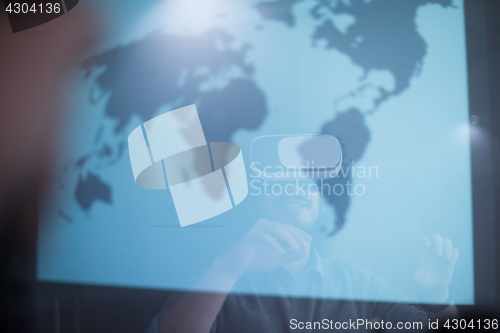 Image of businessman using VR-headset glasses of virtual reality