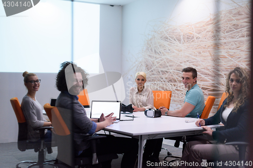 Image of Startup Business Team At A Meeting at modern night office buildi