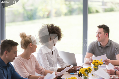 Image of Multiethnic startup business team on meeting