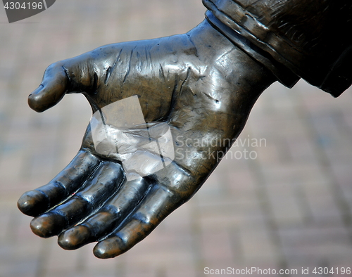 Image of Helping hand statue.