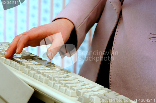 Image of Female on computer.
