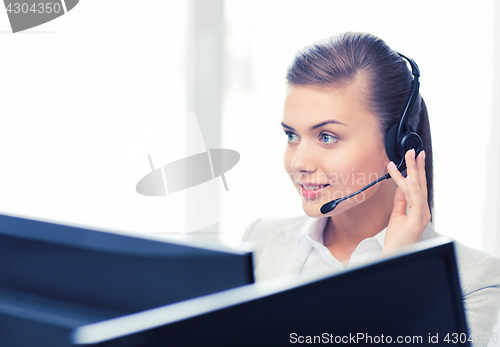 Image of friendly female helpline operator