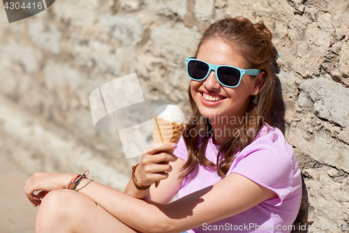 Image of happy woman or teen girl with ice cream in summer
