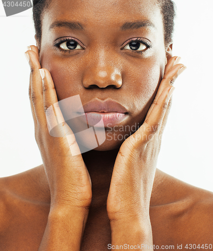 Image of young pretty african american woman naked taking care of her skin isolated on white background, healthcare people concept 