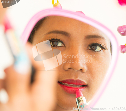 Image of Lipstick In Mirror Application Shows Beauty And Makeup