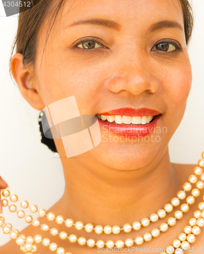 Image of Pearl Necklace On Girl Shows Stylish Jewelry