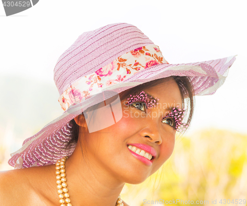 Image of Smiling Beauty In Hat Shows Vibrant Elegance