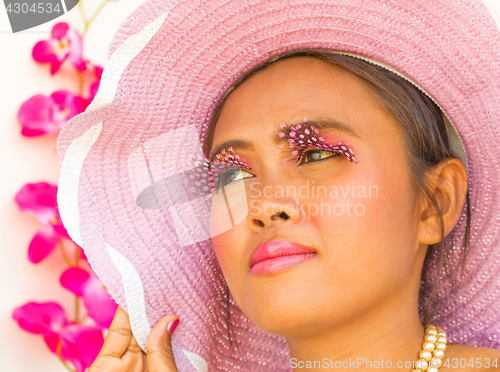 Image of Beauty Wearing Big Eyelashes Shows Vibrant Elegance