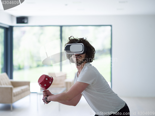 Image of man using VR-headset glasses of virtual reality