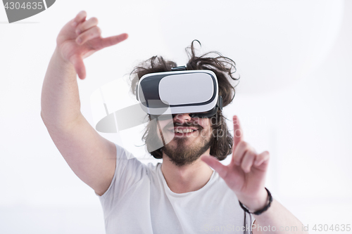 Image of Man using headset of virtual reality