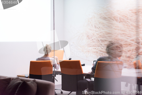 Image of Startup Business Team At A Meeting at modern night office buildi