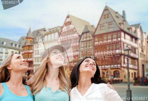 Image of happy women over frankfurt am main background