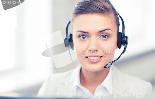 Image of friendly female helpline operator