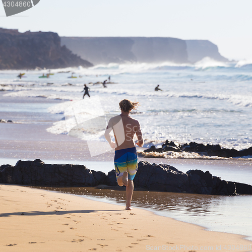 Image of Active people on El Cotillo beach, Fuerteventura, Canary Islands, Spain.