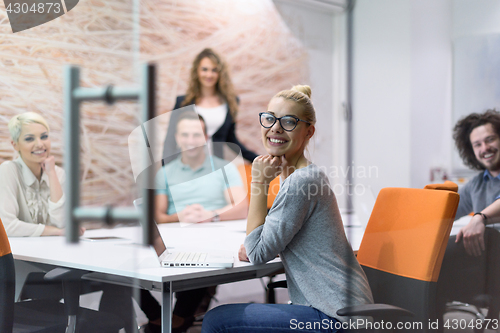 Image of Startup Business Team At A Meeting at modern night office buildi