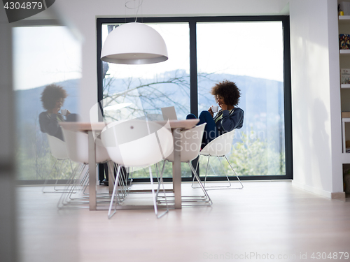 Image of African American woman in the living room