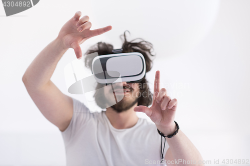 Image of Man using headset of virtual reality