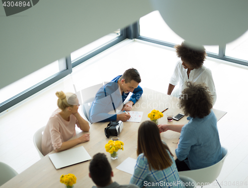 Image of Multiethnic startup Business Team At A Meeting at modern office 