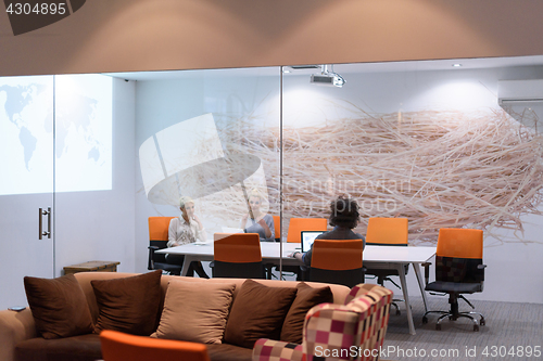 Image of Startup Business Team At A Meeting at modern night office buildi