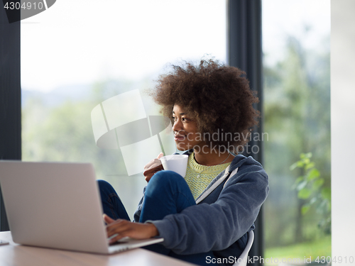 Image of African American woman in the living room