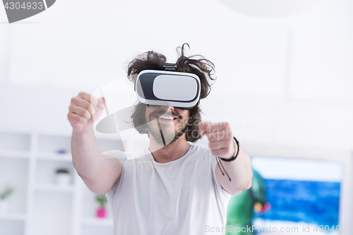 Image of man using VR-headset glasses of virtual reality