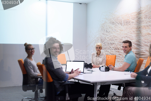 Image of Startup Business Team At A Meeting at modern night office buildi