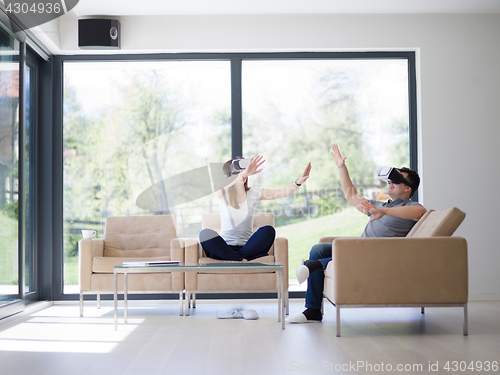 Image of Couple using virtual reality headset