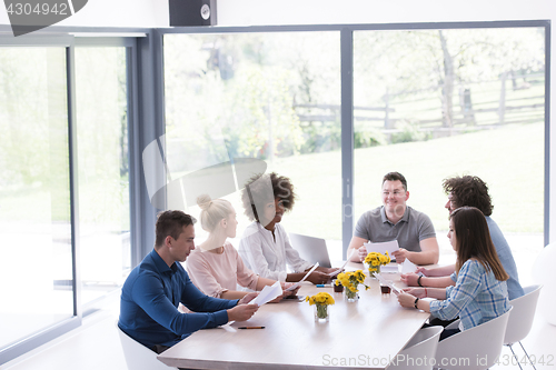 Image of Multiethnic startup business team on meeting