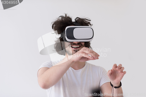 Image of Man using headset of virtual reality