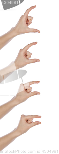 Image of Different gesture of hands to hold something in different size
