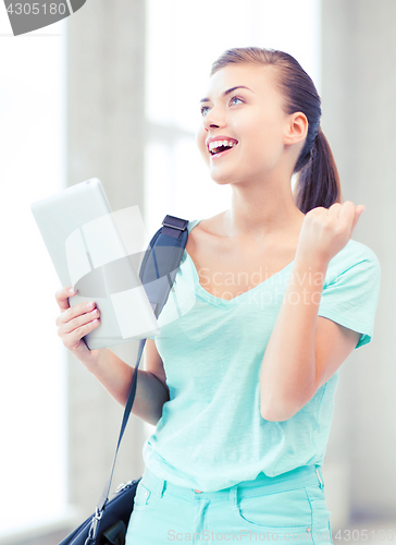 Image of happy student girl with tablet pc