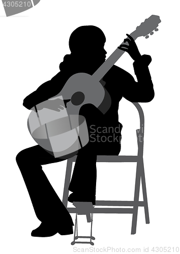 Image of Young woman playing acoustic guitar