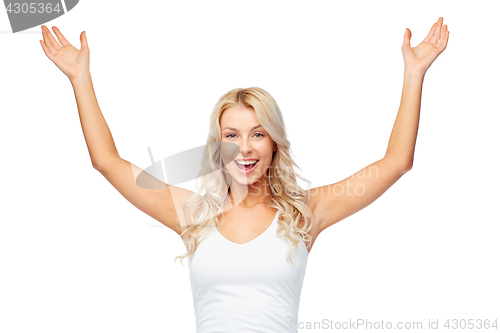 Image of happy young woman celebrating victory